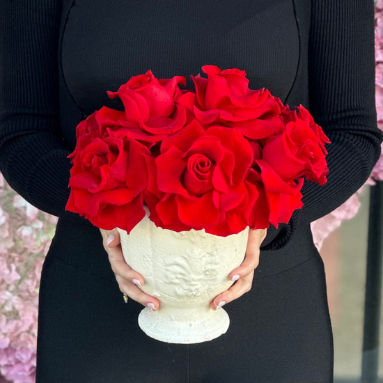 Red Preserved Roses In a Vintage Vase