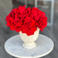 Red Preserved Roses In a Vintage Vase