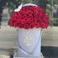 50 Red Roses & White Orchid In Our Signature Velvet Box